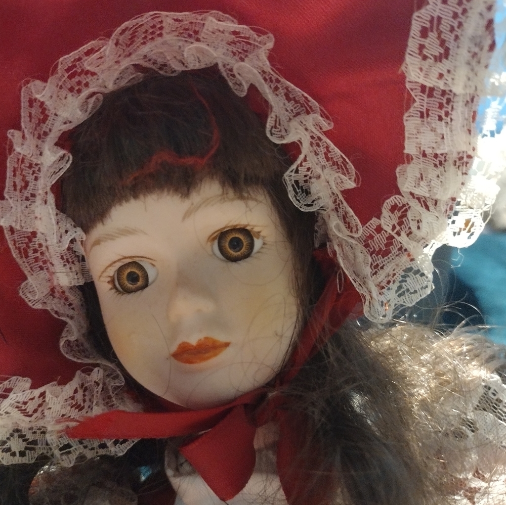 Artmark brunette porcelain doll